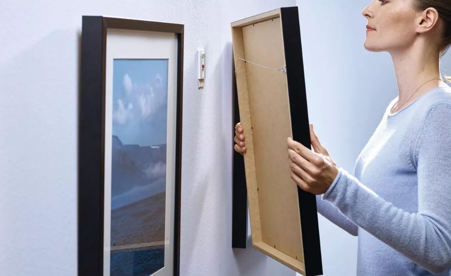 plakkers voor de muur zonder boren