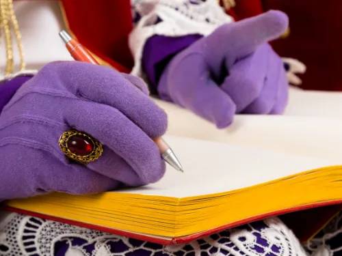 Sinterklaas schrijft in het grote boek